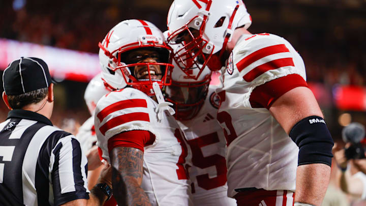 Nebraska wide receiver Nyziah Hunter (left) celebrates his touchdown catch late in the second quarter.
