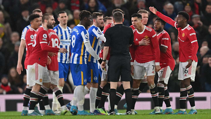 Man Utd players surrounded referee Peter Bankes on Tuesday night