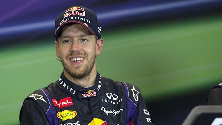 Nov 17, 2013; Austin, TX, USA; Formula One driver Sebastian Vettel (1) is interviewed after winning the United States Grand Prix at Circuit of the Americas. Mandatory Credit: Jerome Miron-USA TODAY Sports