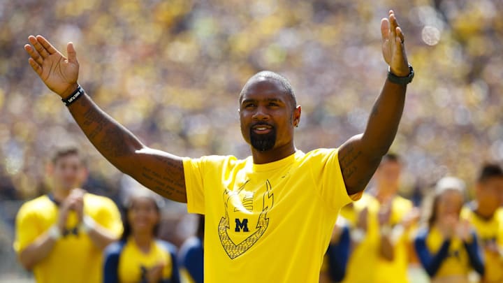Sep 3, 2016; Ann Arbor, MI, USA; Michigan Wolverines former player Charles Woodson is introduced during the first half of the game against the Hawaii Warriors at Michigan Stadium. Mandatory Credit: Rick Osentoski-Imagn Images