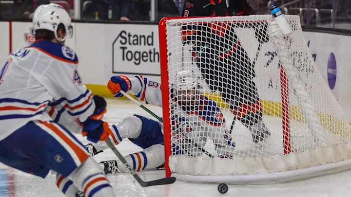 Bakersfield forward Carter Savoie (48) crashes into the goal after a play during the third period of