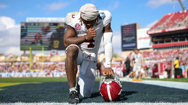 Dec 31, 2024; Tampa, FL, USA; Alabama Crimson Tide quarterback Jalen Milroe (4) gets ready to play the third quarter against the Michigan Wolverines during the ReliaQuest Bowl at Raymond James Stadium. Dec 31, 2024; Tampa, FL, USA; Alabama Crimson Tide quarterback Jalen Milroe (4) gets ready to play the third quarter against the Michigan Wolverines during the ReliaQuest Bowl at Raymond James Stadium.