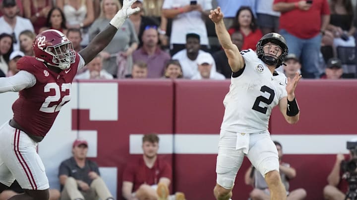 Oct 4, 2025; Tuscaloosa, Alabama, USA;  Alabama defensive lineman LT Overton (22) pressures Vanderbilt quarterback Diego Pavia (2) at Saban Field at Bryant-Denny Stadium. Alabama downed Vanderbilt 30-14. Mandatory Credit: Gary Cosby Jr.-Imagn Images