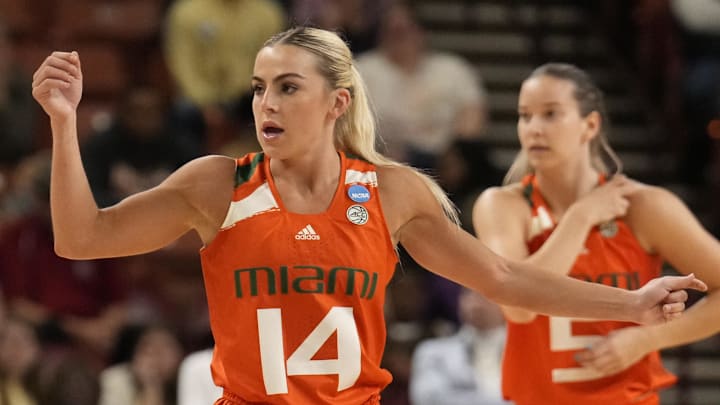 Mar 26, 2023; Greenville, SC, USA; Miami Hurricanes guard Haley Cavinder (14) during the NCAA Women   s Tournament against the LSU Lady Tigersat Bon Secours Wellness Arena. Mandatory Credit: Jim Dedmon-Imagn Images