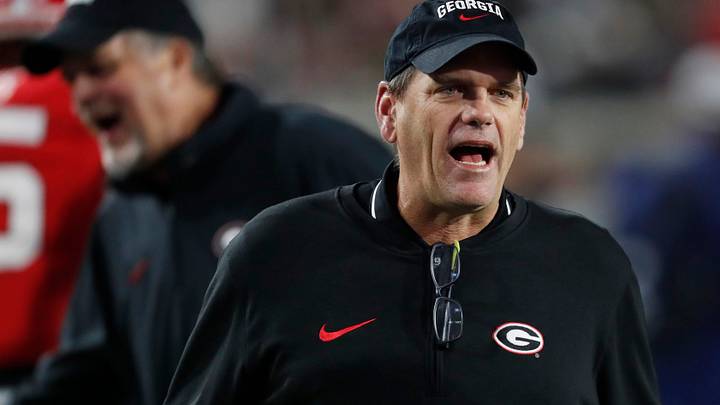 Georgia Offensive Coordinator Mike Bobo on the field during warm ups before the start of a NCAA college football game against Georgia Tech in Atlanta, on Saturday, Nov. 25, 2023.
