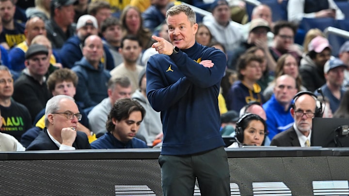 Mar 21, 2026; Buffalo, NY, USA; Michigan Wolverines head coach Dusty May reacts in the second half against the Saint Louis Billikens during a second round game of the men's 2026 NCAA Tournament at Keybank Center. Mandatory Credit: Mark Konezny-Imagn Images Mar 21, 2026; Buffalo, NY, USA; Michigan Wolverines head coach Dusty May reacts in the second half against the Saint Louis Billikens during a second round game of the men's 2026 NCAA Tournament at Keybank Center. Mandatory Credit: Mark Konezny-Imagn Images