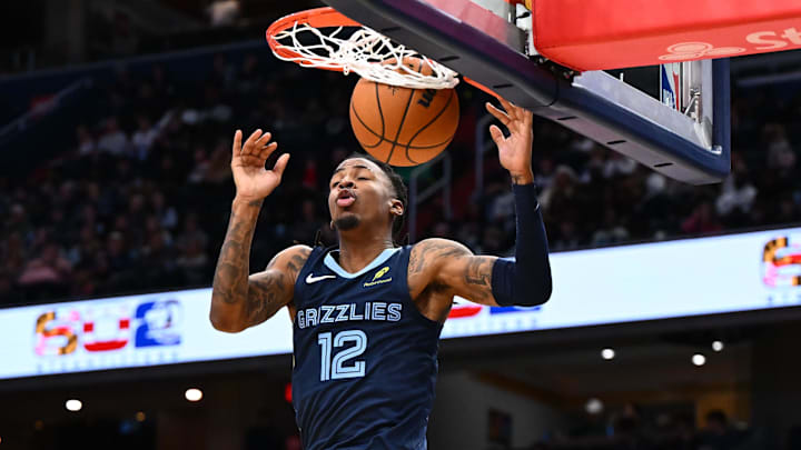 Dec 28, 2025; Washington, District of Columbia, USA; Memphis Grizzlies guard Ja Morant (12) dunks the ball against the Washington Wizards during the first half at Capital One Arena. Mandatory Credit: Brad Mills-Imagn Images Dec 28, 2025; Washington, District of Columbia, USA; Memphis Grizzlies guard Ja Morant (12) dunks the ball against the Washington Wizards during the first half at Capital One Arena. Mandatory Credit: Brad Mills-Imagn Images