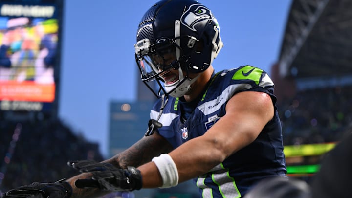 Jan 25, 2026; Seattle, WA, USA; Seattle Seahawks wide receiver Jaxon Smith-Njigba (11) celebrates after scoring a touchdown against the Los Angeles Rams during the first half in the 2026 NFC Championship Game at Lumen Field. 