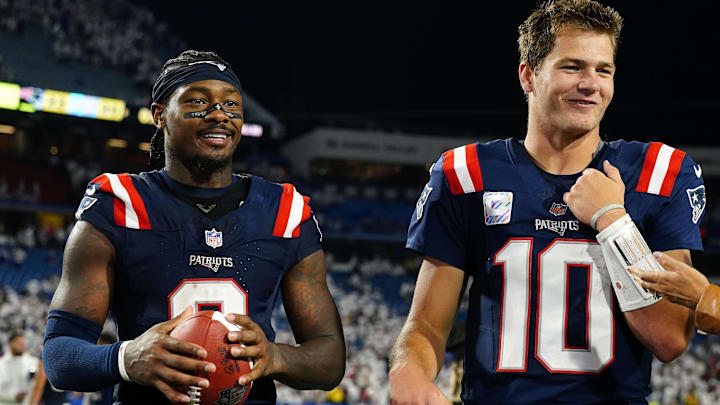 Oct 5, 2025; Orchard Park, New York, USA; New England Patriots quarterback Drake Maye (10) and wide receiver Stefon Diggs (8) walk off the field against the Buffalo Bills after the game at Highmark Stadium.