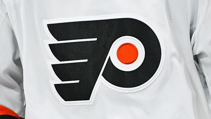 Mar 28, 2024; Montreal, Quebec, CAN; View of a Philadelphia Flyers logo on a jersey worn by a member of the team against the Montreal Canadiens during the second period at Bell Centre. Mandatory Credit: David Kirouac-Imagn Images