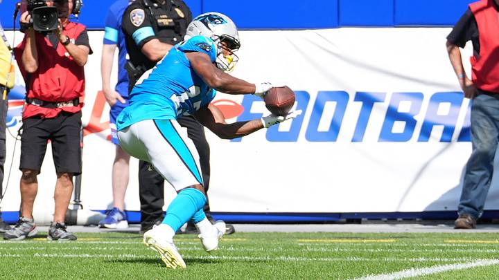 Carolina Panthers wide receiver John Metchie III (13) catches a pass for a touchdown 