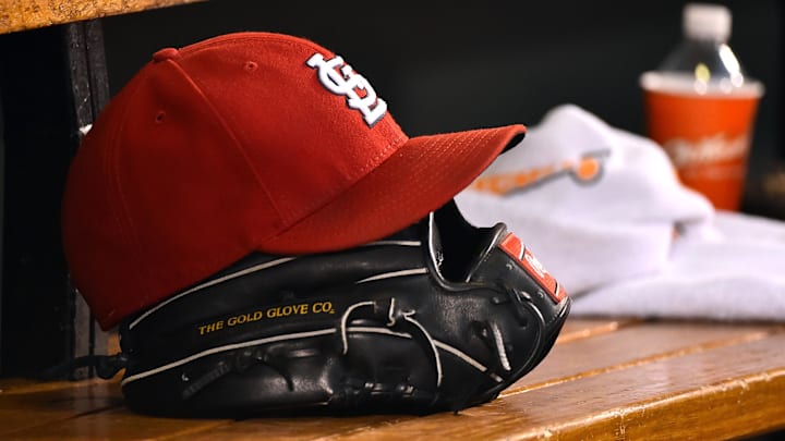 Aug 15, 2015; St. Louis, MO, USA; A detailed view of a baseball glove and St. Louis Cardinals hat in the dugout during the game between the Cardinals and the Miami Marlins at Busch Stadium. Mandatory Credit: Jasen Vinlove-Imagn Images Aug 15, 2015; St. Louis, MO, USA; A detailed view of a baseball glove and St. Louis Cardinals hat in the dugout during the game between the Cardinals and the Miami Marlins at Busch Stadium. Mandatory Credit: Jasen Vinlove-Imagn Images