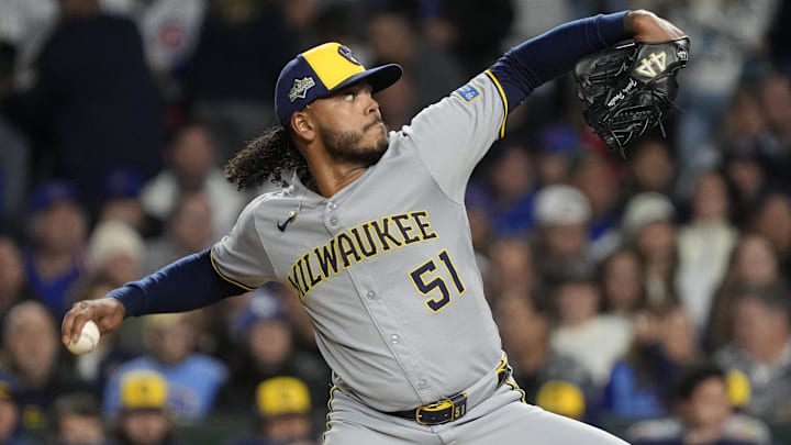 Oct 9, 2025; Chicago, Illinois, USA; Milwaukee Brewers pitcher Freddy Peralta (51) throws pitch against the Chicago Cubs during the first inning for game four of the NLDS round for the 2025 MLB playoffs at Wrigley Field. Mandatory Credit: David Banks-Imagn Images