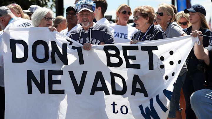Penn State Nittany Lion fans await the arrival of the team prior to the game against the Nevada Wolf Pack at Beaver Stadium. 