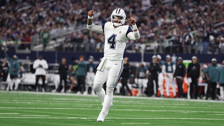 Dallas Cowboys quarterback Dak Prescott celebrates a touchdown in the second quarter against the Philadelphia Eagles at AT&T Stadium. Dallas Cowboys quarterback Dak Prescott celebrates a touchdown in the second quarter against the Philadelphia Eagles at AT&T Stadium.