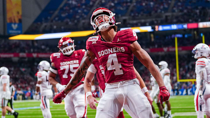 Dec 28, 2023; San Antonio, TX, USA; Oklahoma Sooners wide receiver Nic Anderson (4) celebrates a touchdown catch in the first half against the Arizona Wildcats at Alamodome. Mandatory Credit: Daniel Dunn-Imagn Images Dec 28, 2023; San Antonio, TX, USA; Oklahoma Sooners wide receiver Nic Anderson (4) celebrates a touchdown catch in the first half against the Arizona Wildcats at Alamodome. Mandatory Credit: Daniel Dunn-Imagn Images
