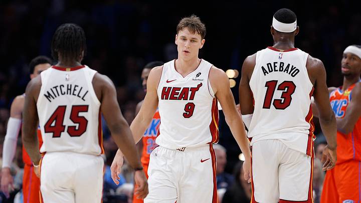 Jan 11, 2026; Oklahoma City, Oklahoma, USA; Miami Heat guard Davion Mitchell (45), guard Pelle Larsson (9), and center/forward Bam Adebayo (13) stand after a play against the Oklahoma City Thunder during the second half at Paycom Center. Mandatory Credit: Alonzo Adams-Imagn Images Jan 11, 2026; Oklahoma City, Oklahoma, USA; Miami Heat guard Davion Mitchell (45), guard Pelle Larsson (9), and center/forward Bam Adebayo (13) stand after a play against the Oklahoma City Thunder during the second half at Paycom Center. Mandatory Credit: Alonzo Adams-Imagn Images