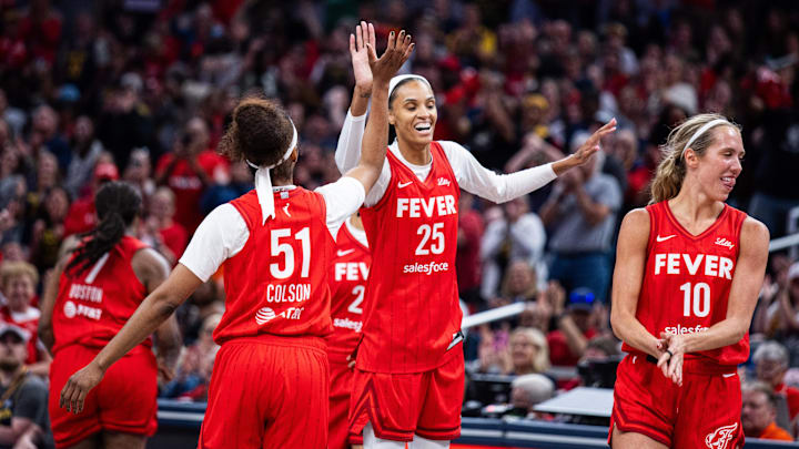 May 17, 2025; Indianapolis, Indiana, USA; Indiana Fever forward DeWanna Bonner (25) celebrates becoming the 3rd most leading points scorer in the WNBA in the second half against the Chicago Sky at Gainbridge Fieldhouse. Mandatory Credit: Trevor Ruszkowski-Imagn Images