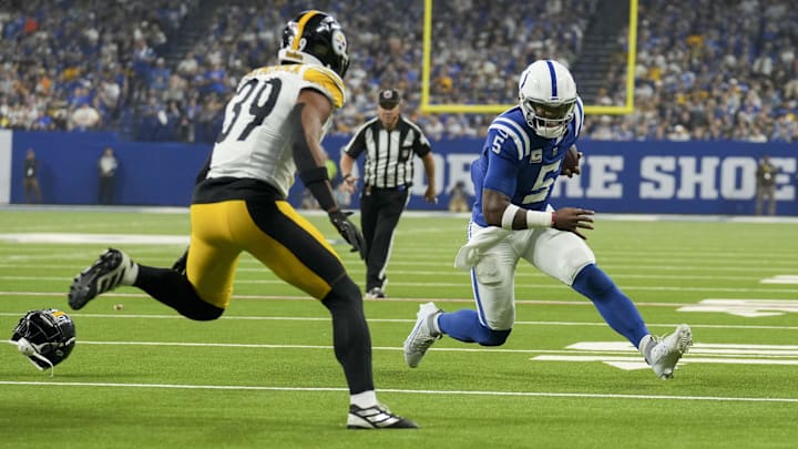 Sep 29, 2024; Indianapolis, Indiana, USA; Indianapolis Colts quarterback Anthony Richardson (5) rushes the ball as Pittsburgh Steelers safety Minkah Fitzpatrick (39) closes in Sunday, Sept. 29, 2024, during a game against the Pittsburgh Steelers at Lucas Oil Stadium in Indianapolis. Mandatory Credit: Christine Tannous-USA TODAY Network via Imagn Images Sep 29, 2024; Indianapolis, Indiana, USA; Indianapolis Colts quarterback Anthony Richardson (5) rushes the ball as Pittsburgh Steelers safety Minkah Fitzpatrick (39) closes in Sunday, Sept. 29, 2024, during a game against the Pittsburgh Steelers at Lucas Oil Stadium in Indianapolis. Mandatory Credit: Christine Tannous-USA TODAY Network via Imagn Images