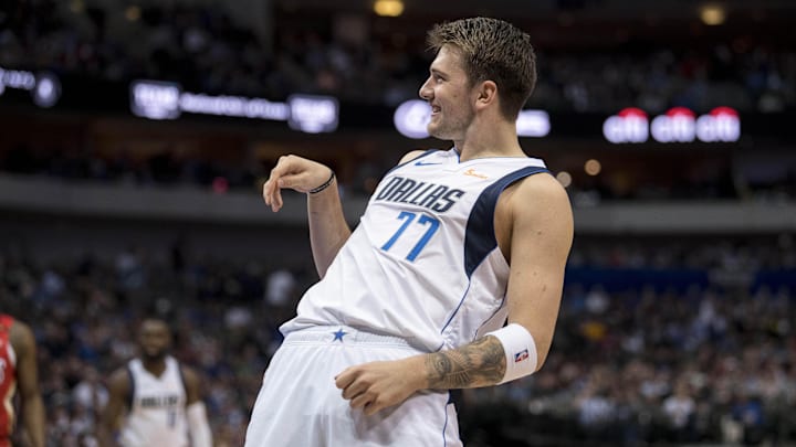 Mar 18, 2019; Dallas, TX, USA; Dallas Mavericks forward Luka Doncic (77) smiles after making a shot