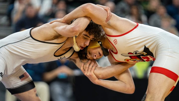 Saint John Vianney’s Anthony Knox, left, wrestles Bergen Catholic’s Nathan Braun in the championship XX match during finals of the NJSIAA individual wrestling state championships at Boardwalk Hall in Atlantic City on Friday, March 8, 2025. Saint John Vianney’s Anthony Knox is awarded the 126lb state championship title and is a 4-time state champion.