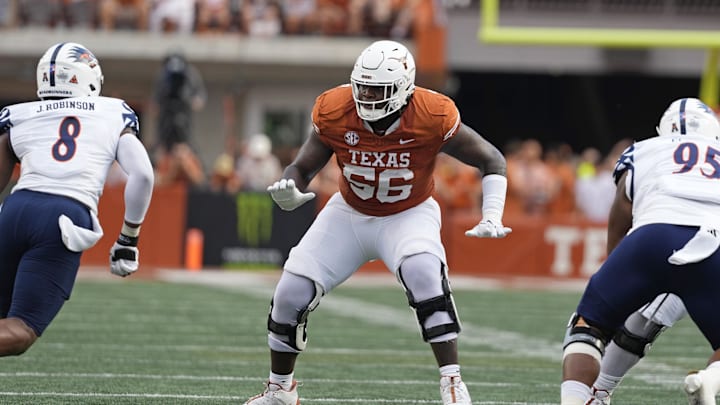 Sep 14, 2024; Austin, Texas, USA; Texas Longhorns offensive lineman Cameron Williams (56) blocks during the first half against the Texas-San Antonio Roadrunners at Texas at Darrell K Royal-Texas Memorial Stadium. Mandatory Credit: Scott Wachter-Imagn Images