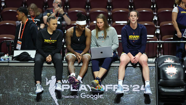 Caitlin Clark prepares for a playoff game.