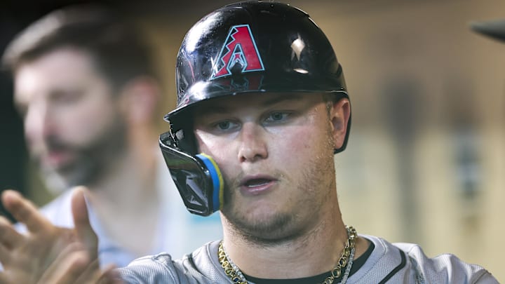 Sep 8, 2024; Houston, Texas, USA; Arizona Diamondbacks designated hitter Joc Pederson (3) celebrates in the dugout after scoring a run during the third inning against the Houston Astros at Minute Maid Park. Sep 8, 2024; Houston, Texas, USA; Arizona Diamondbacks designated hitter Joc Pederson (3) celebrates in the dugout after scoring a run during the third inning against the Houston Astros at Minute Maid Park.