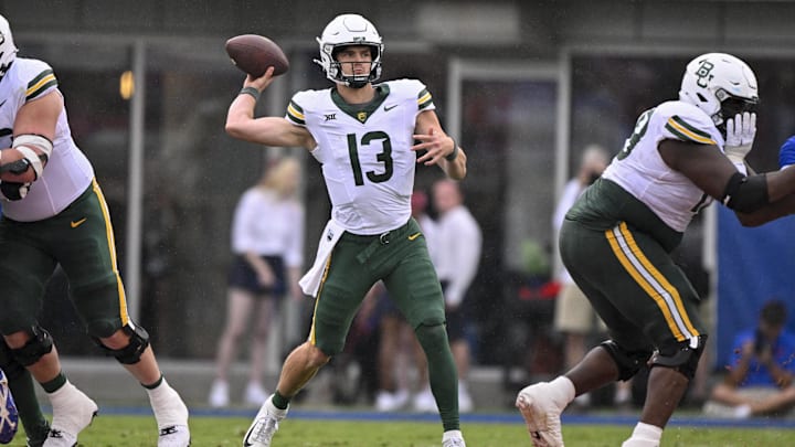 Sep 6, 2025; Dallas, Texas, USA; Baylor Bears quarterback Sawyer Robertson (13) passes the ball during the second quarter against the SMU Mustangs at Gerald J. Ford Stadium. Mandatory Credit: Jerome Miron-Imagn Images