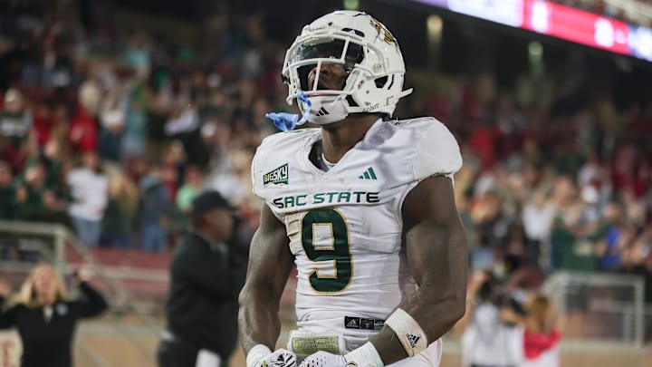 Sacramento State Hornets running back Marcus Fulcher (9) is celebrating after scoring a touchdown. Sacramento State Hornets running back Marcus Fulcher (9) is celebrating after scoring a touchdown.