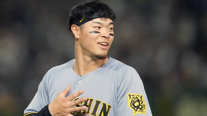 Mar 15, 2025; Bunkyo, Tokyo, Japan; Hanshin Tigers right fielder Teruaki Sato (8) during the fifth inning against the Chicago Cubs at Tokyo Dome. Mandatory Credit: Darren Yamashita-Imagn Images Mar 15, 2025; Bunkyo, Tokyo, Japan; Hanshin Tigers right fielder Teruaki Sato (8) during the fifth inning against the Chicago Cubs at Tokyo Dome. Mandatory Credit: Darren Yamashita-Imagn Images