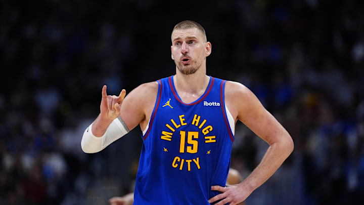 Apr 20, 2026; Denver, Colorado, USA; Denver Nuggets center Nikola Jokic (15) reacts towards the bench in the second half against the Minnesota Timberwolves during game two of the first round of the 2026 NBA Playoffs at Ball Arena.
