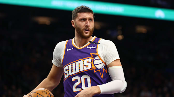 Dec 27, 2024; Phoenix, Arizona, USA; Phoenix Suns center Jusuf Nurkic (20) against the Dallas Mavericks at Footprint Center. Mandatory Credit: Mark J. Rebilas-Imagn Images