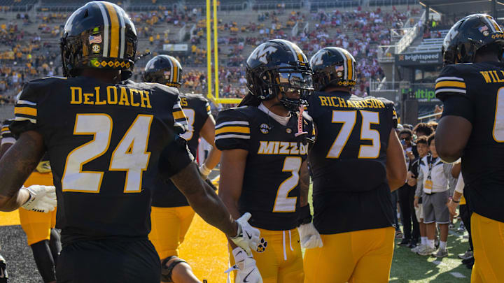 Oct. 11, 2025; Columbia, Missouri, USA; Missouri Tigers wide receiver Marquis Johnson high fives teammates ahead of the Missouri Tigers matchup with Alabama at Faurot Field at Memorial Stadium.
