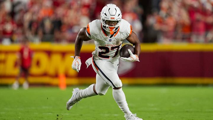 Denver Broncos running back J.K. Dobbins (27) runs the ball during the first half against the Kansas City Chiefs at Arrowhead Stadium. Mandatory Credit: Jay Biggerstaff-Imagn Images Denver Broncos running back J.K. Dobbins (27) runs the ball during the first half against the Kansas City Chiefs at Arrowhead Stadium. Mandatory Credit: Jay Biggerstaff-Imagn Images