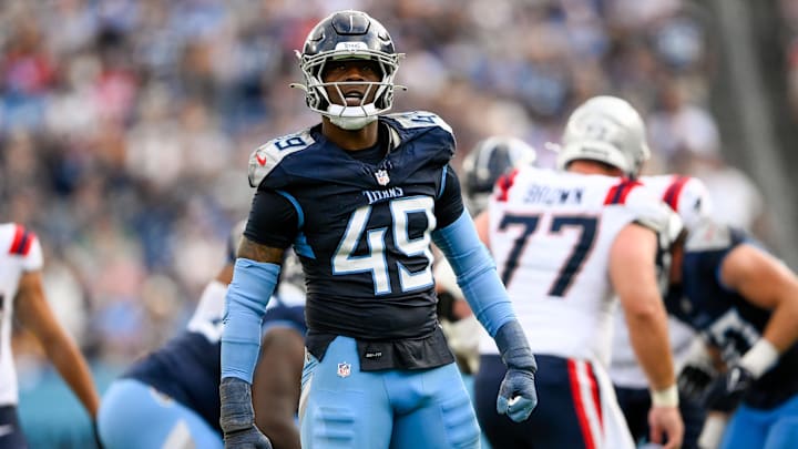 Nov 3, 2024; Nashville, Tennessee, USA;  Tennessee Titans linebacker Arden Key (49) celebrates the strip sack and fumble recovery against the New England Patriots during the second half at Nissan Stadium. Mandatory Credit: Steve Roberts-Imagn Images