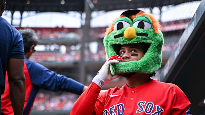 Apr 12, 2026; St. Louis, Missouri, USA; Boston Red Sox first baseman Willson Contreras (40) wears the green monster mask after hitting a two run home run against the St. Louis Cardinals during the first inning at Busch Stadium. Mandatory Credit: Jeff Curry-Imagn Images
