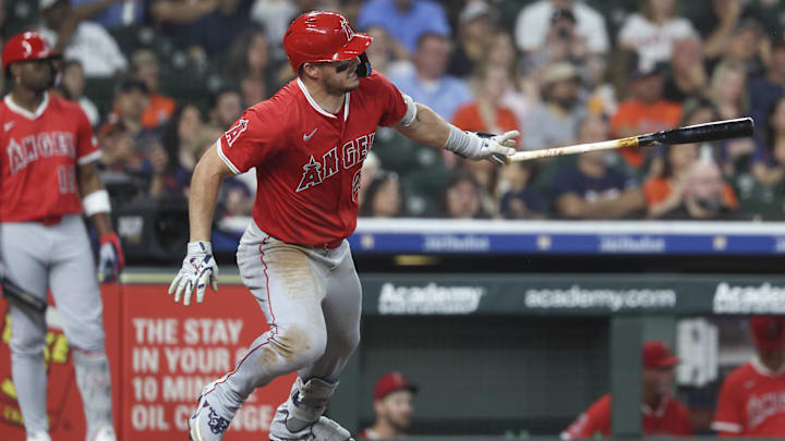 Apr 12, 2025; Houston, Texas, USA; Los Angeles Angels right fielder Mike Trout (27) reaches on a fielders choice during the fifth inning against the Houston Astros at Daikin Park. Mandatory Credit: Troy Taormina-Imagn Images