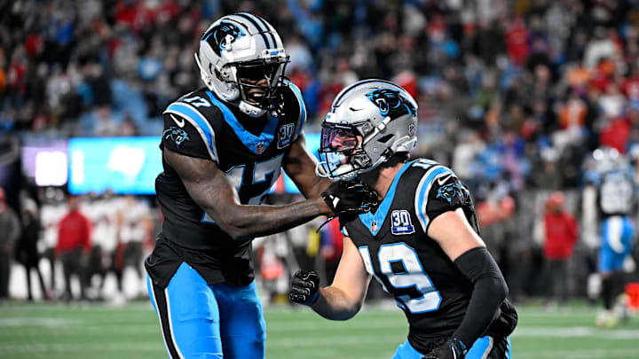 Dec 1, 2024; Charlotte, North Carolina, USA; Carolina Panthers wide receiver Adam Thielen (19) celebrates with wide receiver Xavier Legette (17) after scoring. a touchdown to take the lead with 30 seconds left in the fourth quarter at Bank of America Stadium. Mandatory Credit: Bob Donnan-Imagn Images Dec 1, 2024; Charlotte, North Carolina, USA; Carolina Panthers wide receiver Adam Thielen (19) celebrates with wide receiver Xavier Legette (17) after scoring. a touchdown to take the lead with 30 seconds left in the fourth quarter at Bank of America Stadium. Mandatory Credit: Bob Donnan-Imagn Images