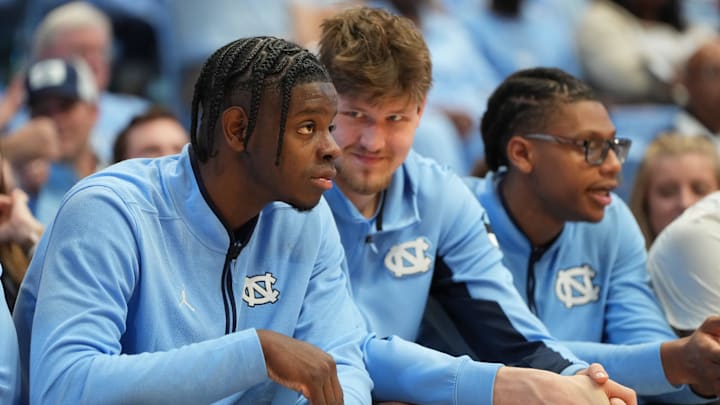 North Carolina Tar Heels forward Caleb Wilson (8) and center Henri Veesaar (13) 