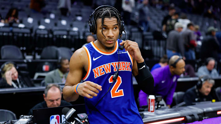 Mar 10, 2025; Sacramento, California, USA; New York Knicks guard Miles McBride (2) is interviewed by media after the game against the Sacramento Kings at Golden 1 Center. Mandatory Credit: Sergio Estrada-Imagn Images