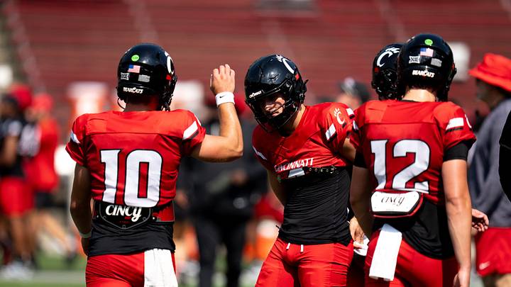 Cincinnati Bearcats Quarterback Liam O'Brien (10) high fives Cincinnati Bearcats JC French IV (4) during the Cincinnati Bearcats football practice at Nippert Stadium in Cincinnati on Saturday, Aug. 8, 2026. Cincinnati Bearcats Quarterback Liam O'Brien (10) high fives Cincinnati Bearcats JC French IV (4) during the Cincinnati Bearcats football practice at Nippert Stadium in Cincinnati on Saturday, Aug. 8, 2026.