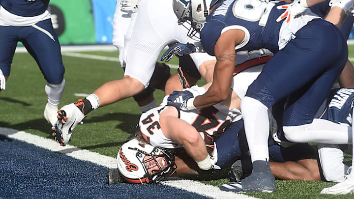 Oregon State’s Jake Reichle scores a touchdown while taking on Nevada at Mackay Stadium in Reno on Oct. 12, 2024.