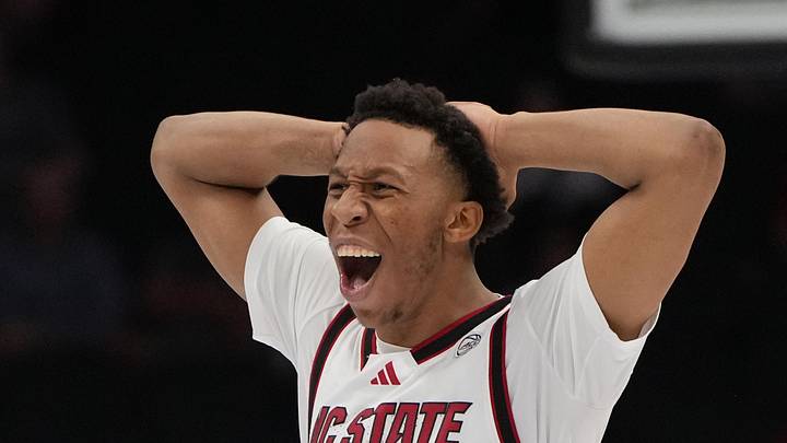 Mar 11, 2026; Charlotte, NC, USA; NC State Wolfpack guard Quadir Copeland (11) reacts in the second half at Spectrum Center. Mandatory Credit: Bob Donnan-Imagn Images