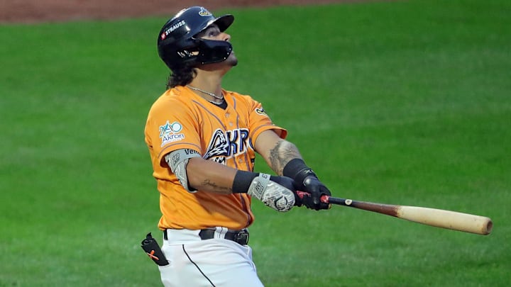 RubberDucks designated hitter Ralphy Velazquez watches his shot down the first-base line during a game Aug. 21, 2025, in Akron.