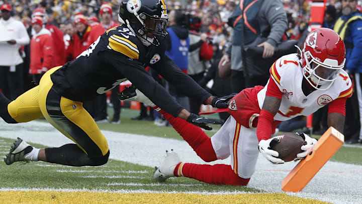 Dec 25, 2024; Pittsburgh, Pennsylvania, USA; Kansas City Chiefs wide receiver Xavier Worthy (1) dives past Pittsburgh Steelers safety Minkah Fitzpatrick (39) into the end-zone for a touchdown during the first quarter at Acrisure Stadium. Mandatory Credit: Charles LeClaire-Imagn Images Dec 25, 2024; Pittsburgh, Pennsylvania, USA; Kansas City Chiefs wide receiver Xavier Worthy (1) dives past Pittsburgh Steelers safety Minkah Fitzpatrick (39) into the end-zone for a touchdown during the first quarter at Acrisure Stadium. Mandatory Credit: Charles LeClaire-Imagn Images