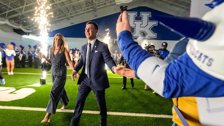New Kentucky Wildcat head coach Will Stein arrives with wife, Darby has he is introduced at Kentucky on Wednesday, December 3, 2025 New Kentucky Wildcat head coach Will Stein arrives with wife, Darby has he is introduced at Kentucky on Wednesday, December 3, 2025