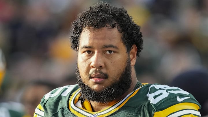 Sep 7, 2025; Green Bay, Wisconsin, USA;  Green Bay Packers guard Aaron Banks (65) during the game against the Detroit Lions at Lambeau Field. Mandatory Credit: Jeff Hanisch-Imagn Images
