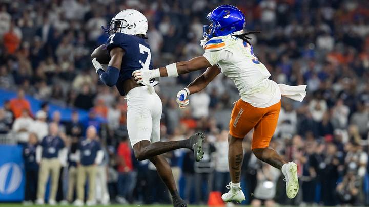 Penn State Nittany Lions cornerback Zion Tracy (7) intercepts a pass intended for Boise State Broncos wide receiver Latrell Caples (3) during the Fiesta Bowl at State Farm Stadium. Penn State Nittany Lions cornerback Zion Tracy (7) intercepts a pass intended for Boise State Broncos wide receiver Latrell Caples (3) during the Fiesta Bowl at State Farm Stadium.