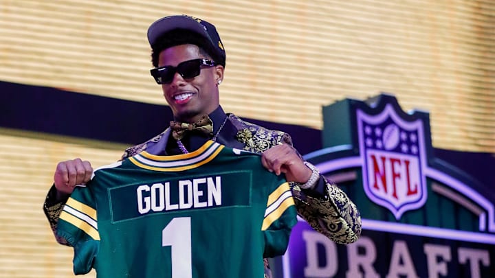 Wide receiver Matthew Golden holds a Green Bay Packers jersey after being selected with the 23rd pick of the first round.